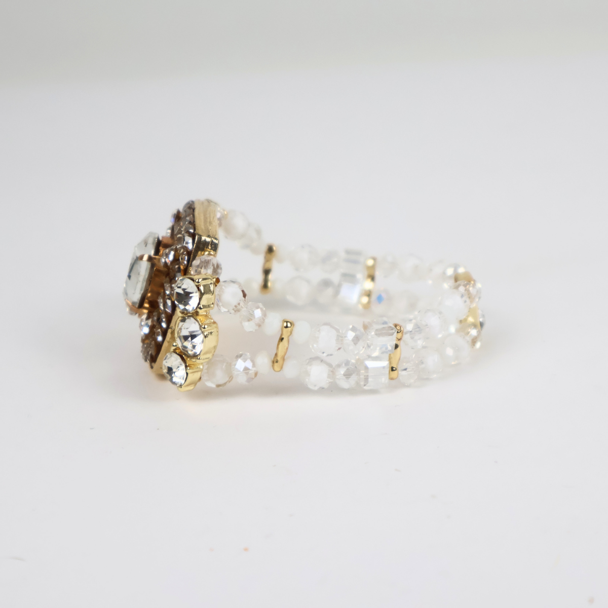 Bracelete Dourado e Cristal Translúcido