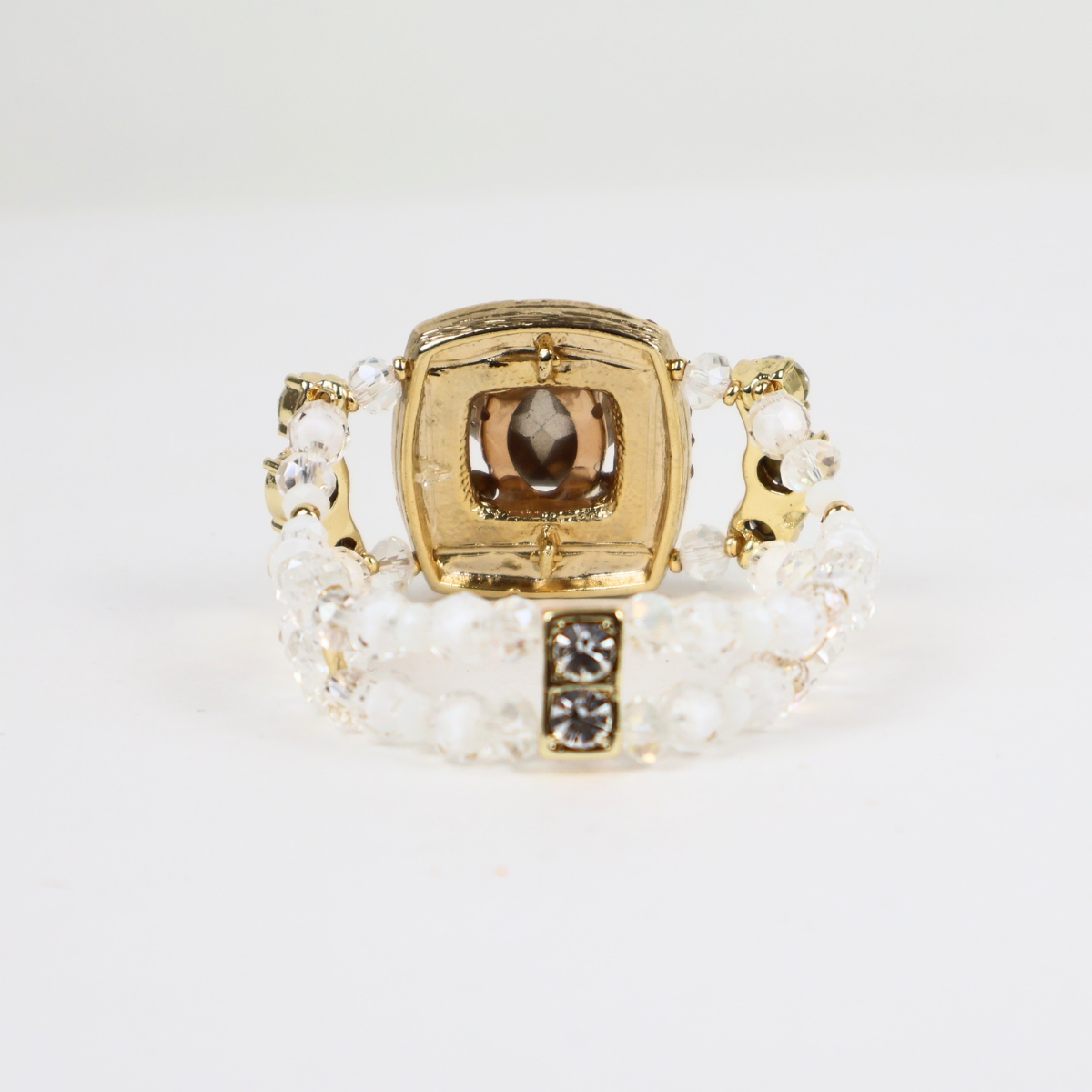 Bracelete Dourado e Cristal Translúcido