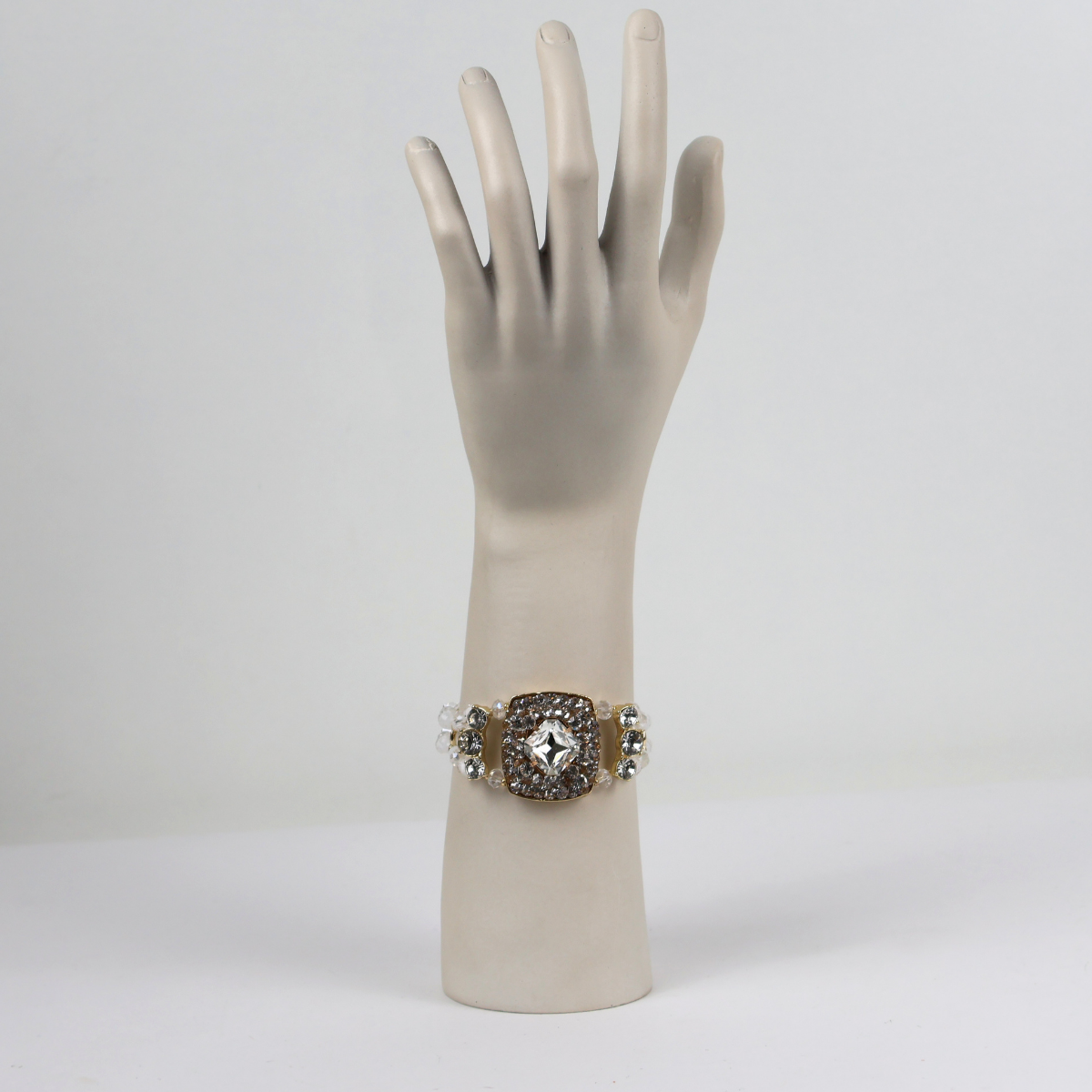 Bracelete Dourado e Cristal Translúcido