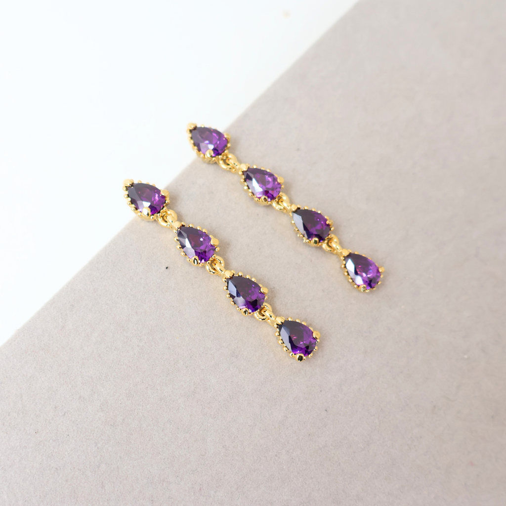 Brinco Prateado e Cristal Roxo
