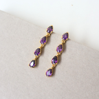 Brinco Prateado e Cristal Roxo