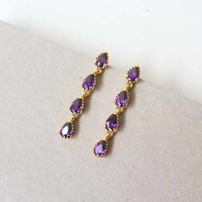 Brinco Prateado e Cristal Roxo