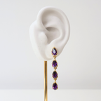 Brinco Prateado e Cristal Roxo