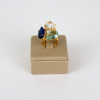 Anel Regulável Dourado e Cristal Azul - Semijoia