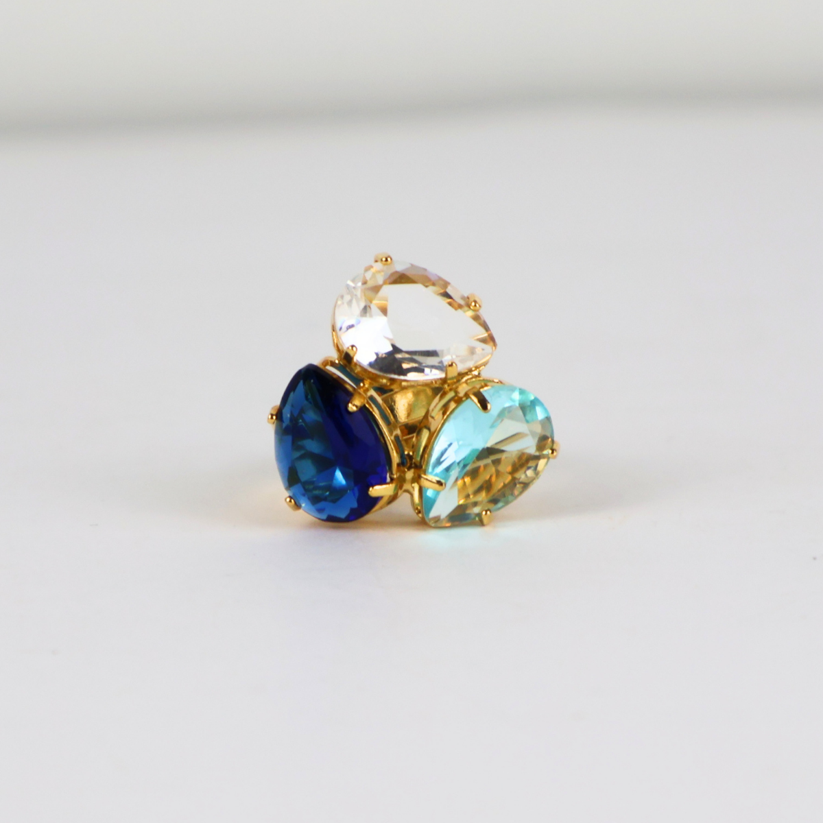 Anel Regulável Dourado e Cristal Azul - Semijoia